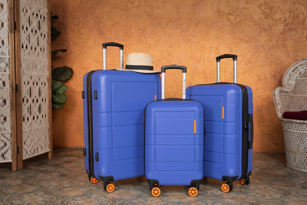 A selection of the best travel suitcases in various sizes and colors, ready for adventure.